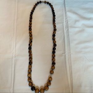 Long variegated wooden bead necklace